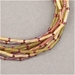 TW2712-1265:  Miyuki 2.7x12mm Twisted Bugle Bead Gold Antiqued Matte Transparent Chartreuse - TW2712-1265*