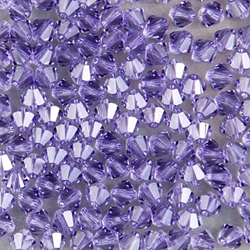 284-280:  5328 4mm bicone  Tanzanite (36 pcs) 