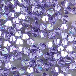 284-281:  5328 4mm bicone  Tanzanite AB (36 pcs) - Discontinued 