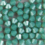286-415:  5301 6mm bicone  Palace Green Opal (36 pcs) 