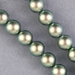 29-0848:  5810 8mm Iridescent Green Crystal Pearl - 29-0848