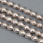 AFR-011:  7x7mm Silver Tone Ethiopian Bicones 30-inch strand (approx 105 pcs) 