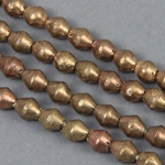 AFR-105:  6 x 7mm Brass Bicones Ethiopia 27-inch strand (approx 100 pcs) 