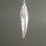 MET-00055: 11 x 52mm Antique Silver Wavy Feather Charm 