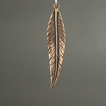 MET-00057: 12 x 52mm Antique Copper Wavy Feather Charm 